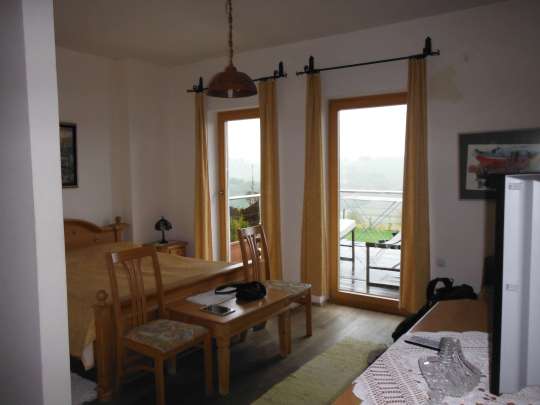 My bedroom, unshared for a change. Nice view of the vineyards when the rain lifts.